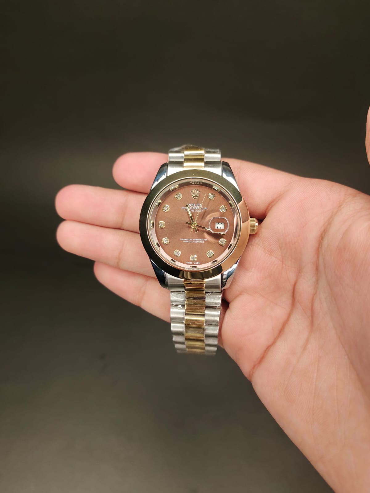 ROLEX in brown dial