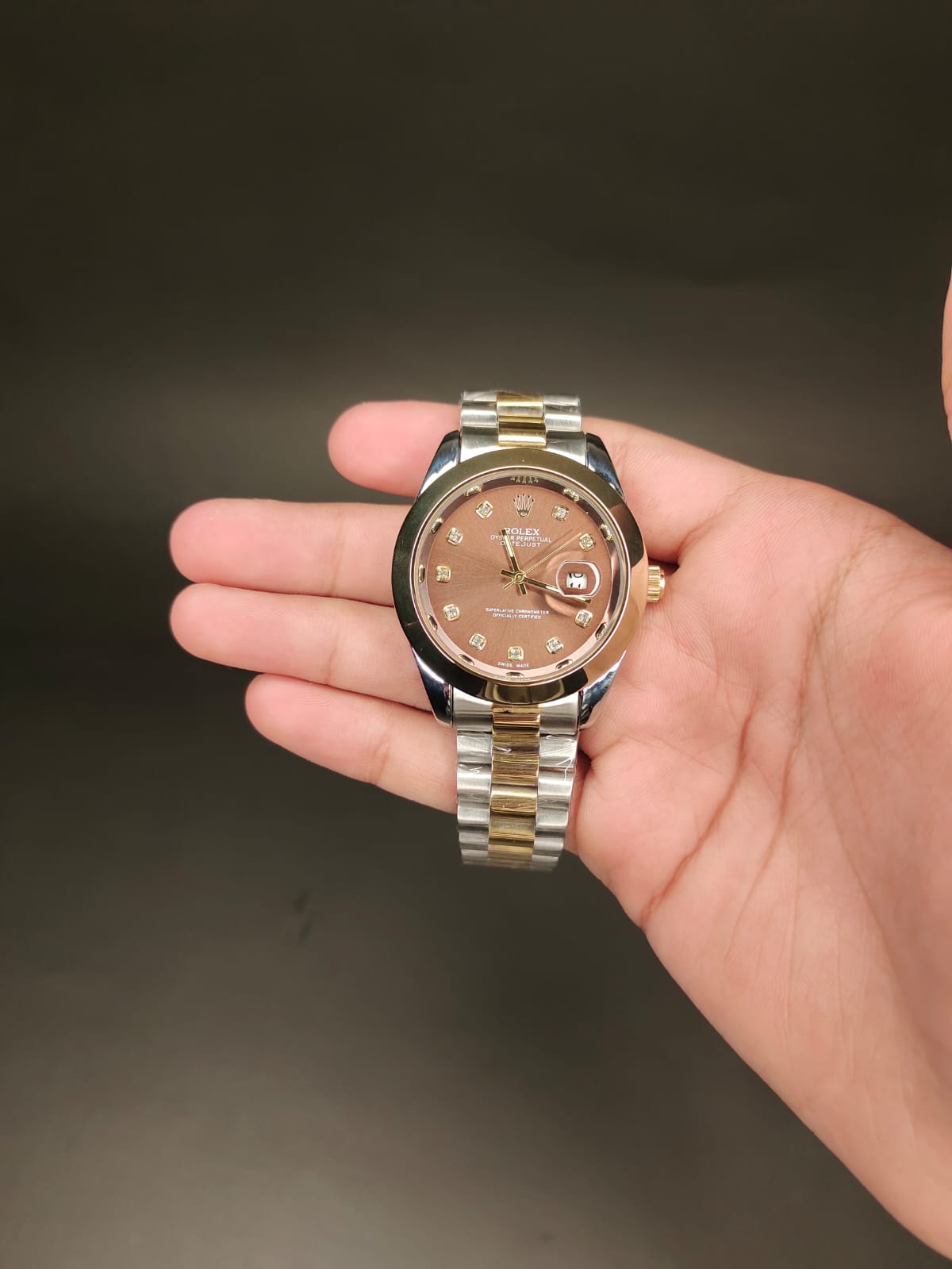 ROLEX in brown dial